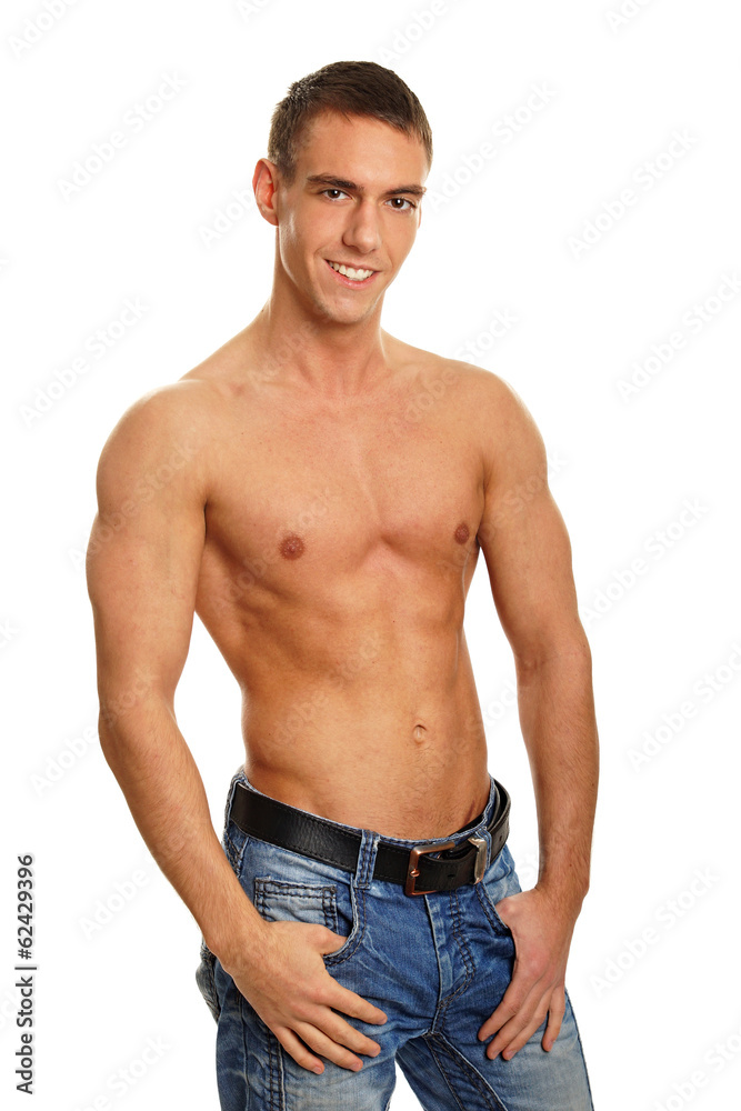 Young muscular smiling man standing poses Young muscular smiling man standing poses