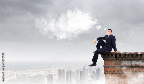 Businessman on top © Sergey Nivens