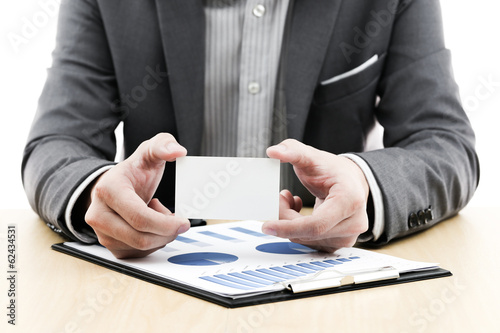 Businessman showing blank business card