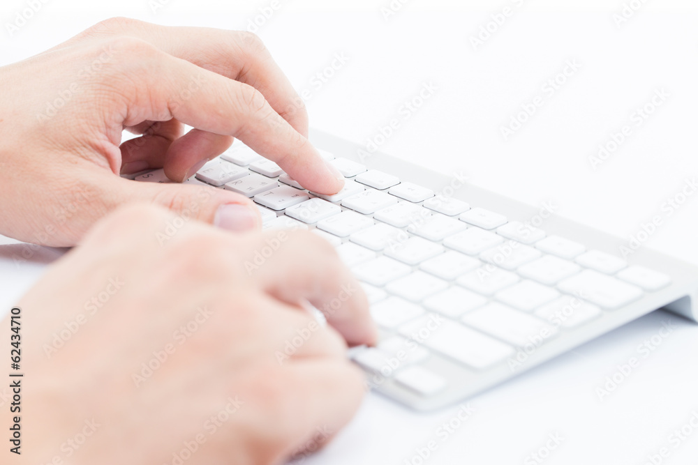 Man hand typing on keyboard Man hand typing on keyboard