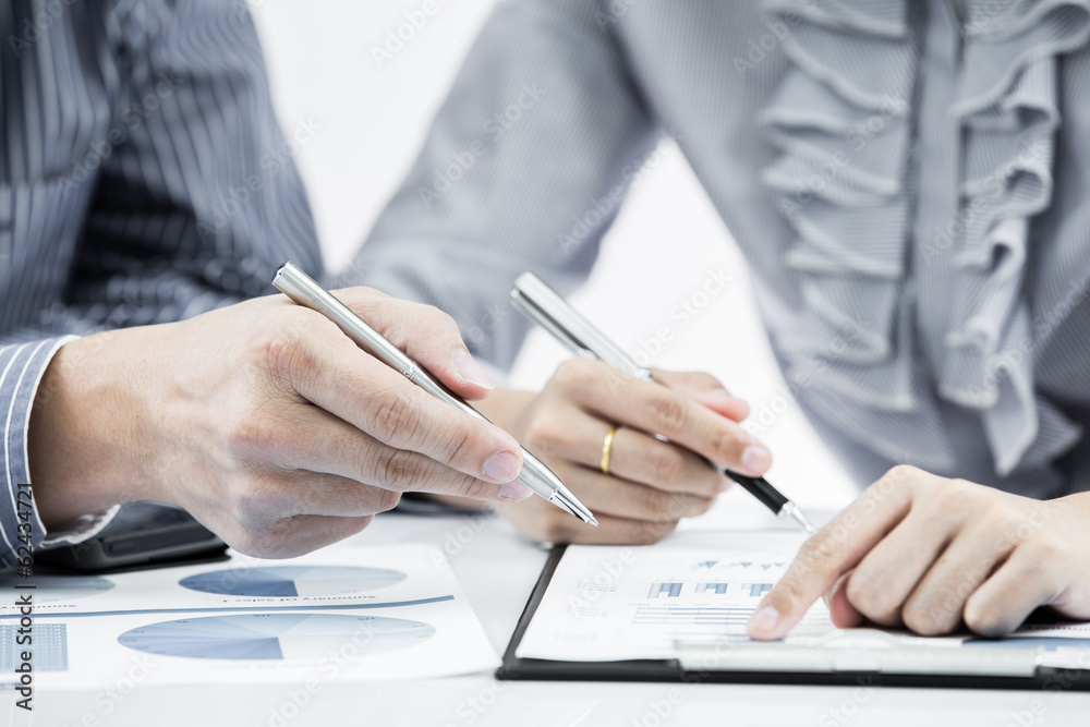 Business people discussing during a meeting Business people discussing during a meeting