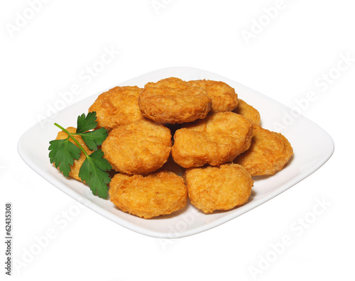 Chicken nuggets in plate isolated on white