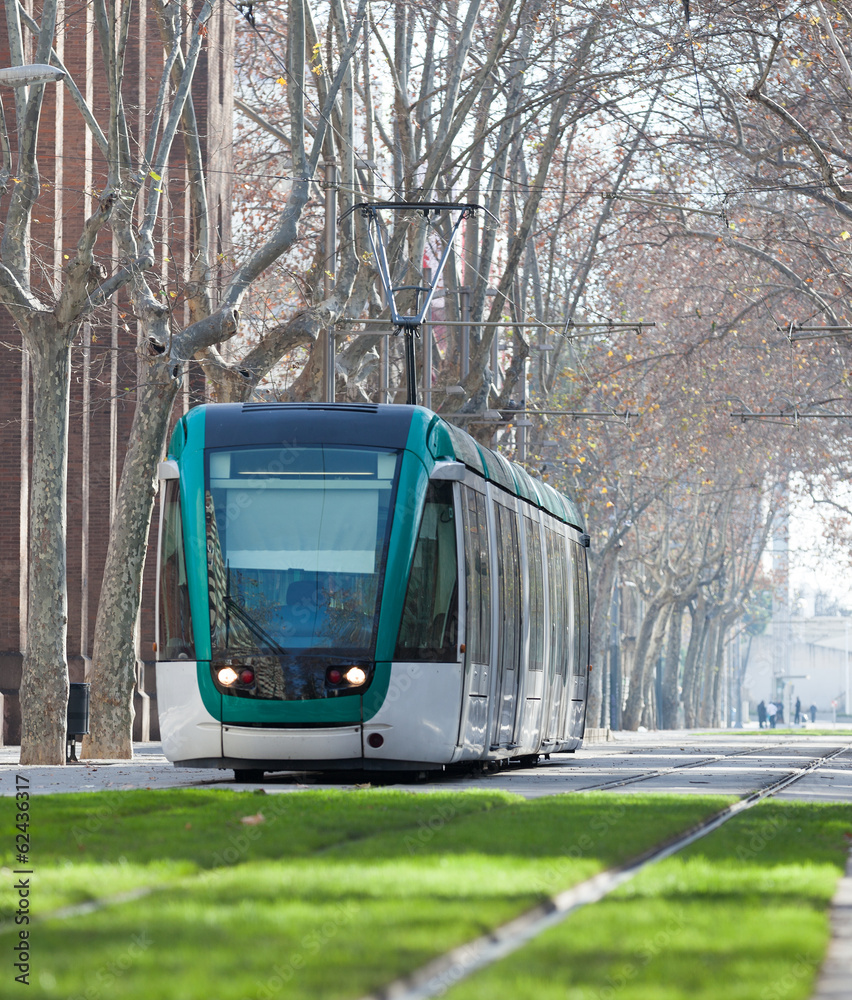 Fototapeta premium tram on street of city