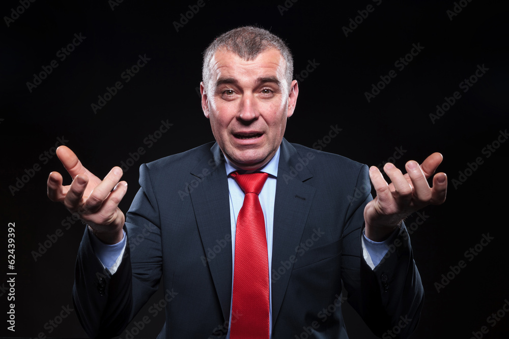 shocked old business man gesturing in confusion shocked old business man gesturing in confusion