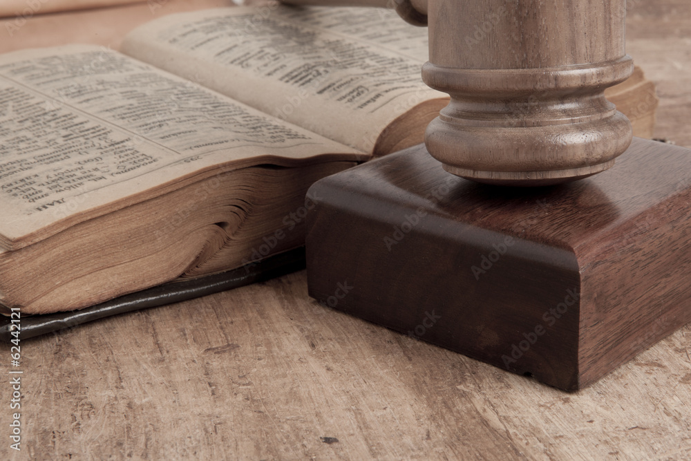Wooden gavel and books Wooden gavel and books