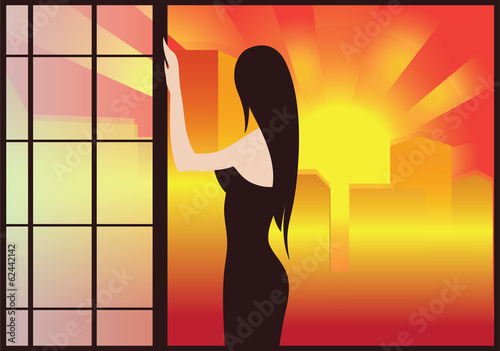 The girl looks at dawn