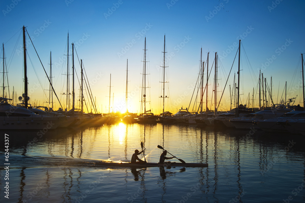 rowing at sunrise