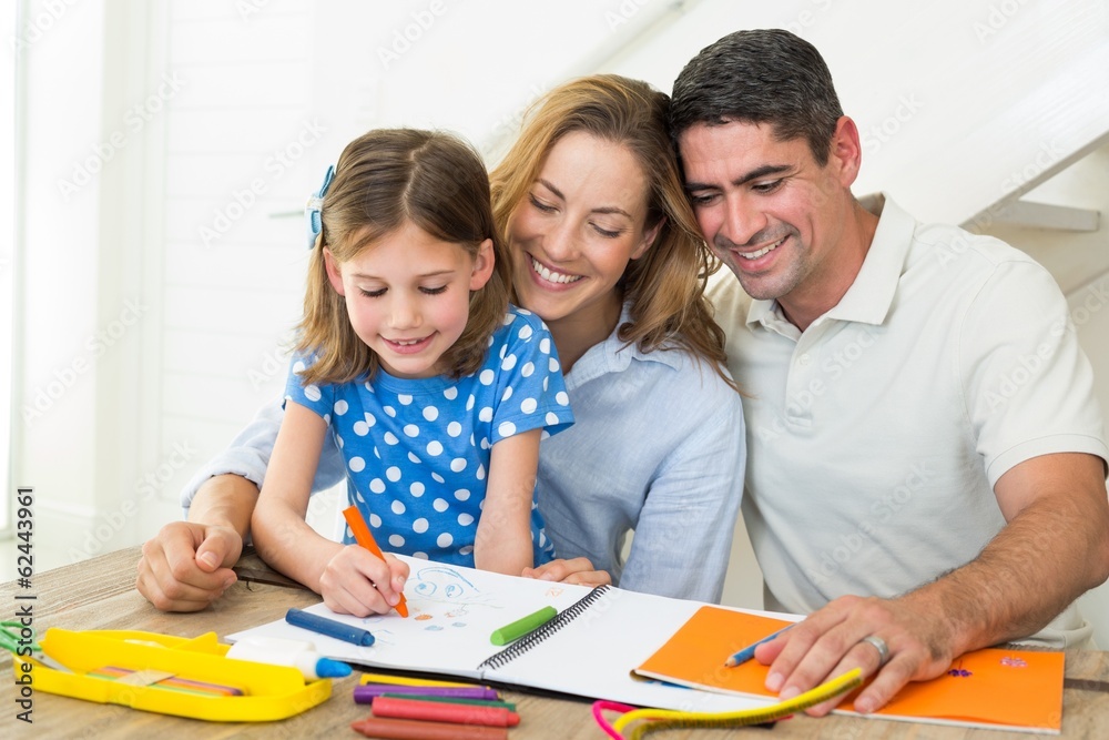 Parents looking at girl coloring Parents looking at girl coloring