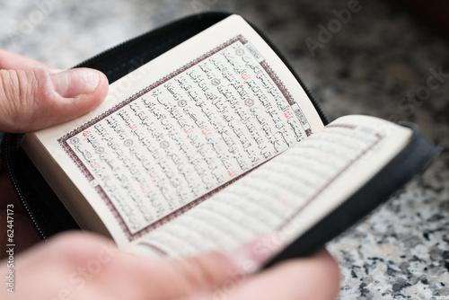 Close-up Muslim Man Reading Koran