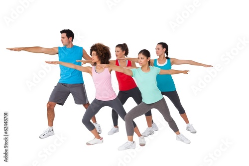 Fitness class doing stretching exercises