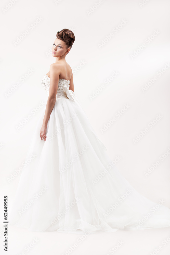 gorgeous bride in long white luxury dress