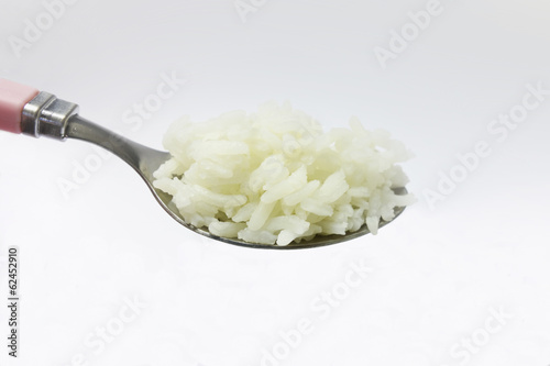 cooked rice on the spoon