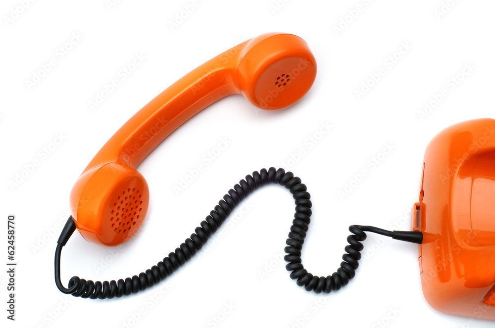 Orange telephone hotline with old retro phone receiver on white background
