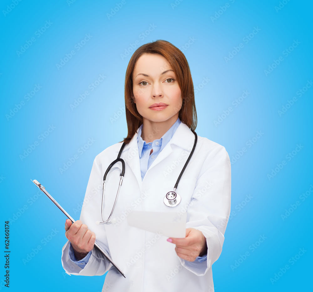 calm female doctor with clipboard calm female doctor with clipboard