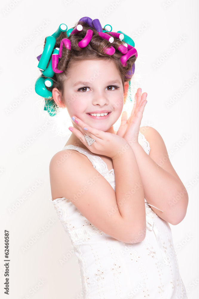 Cute little girl in curlers and pajamas sleep bedtime Cute little girl in curlers and pajamas sleep bedtime