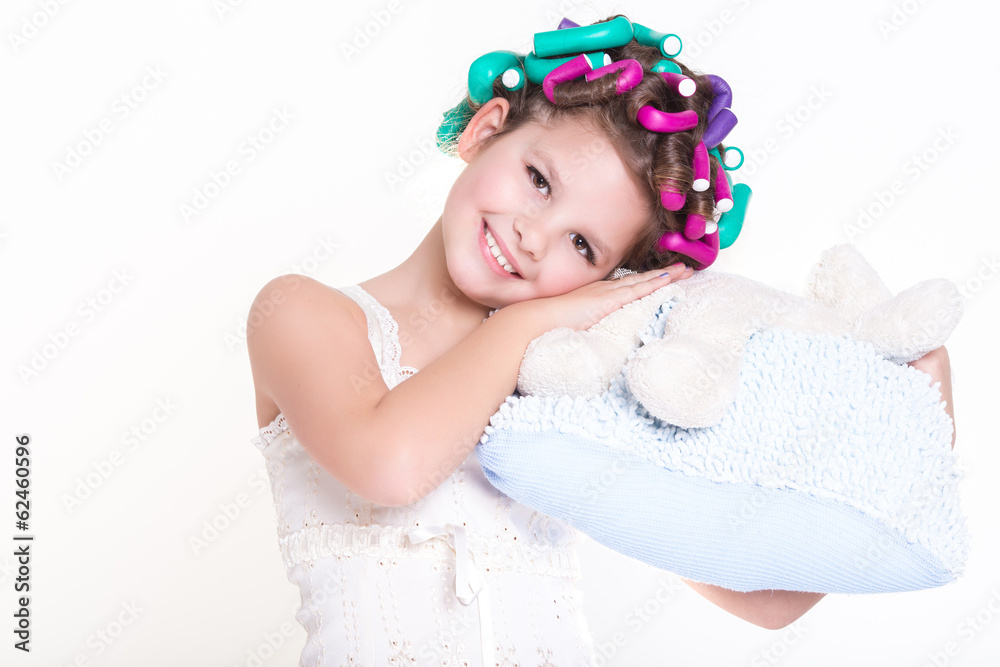 Cute little girl in curlers and pajamas sleep bedtime Cute little girl in curlers and pajamas sleep bedtime