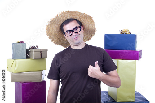 young casual man holding gifts, isolated