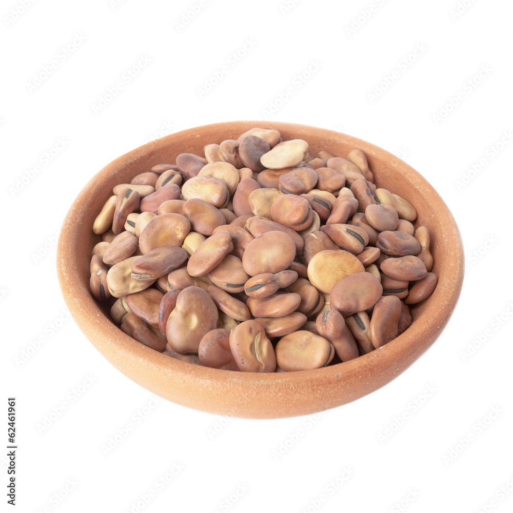 Broad beans in bowl of clay isolated over white Broad beans in bowl of clay isolated over white