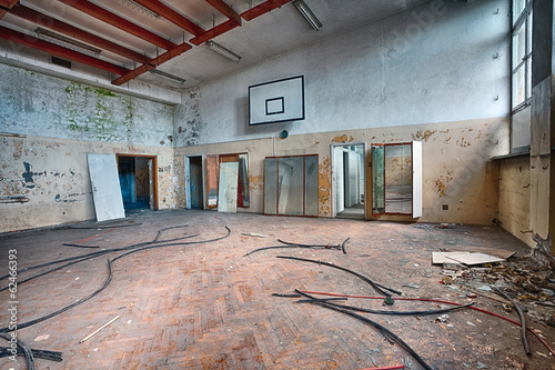 Abandoned sports hall in a devastated building