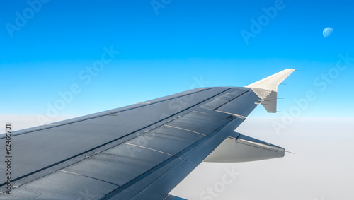 Looking through window aircraft during flight in wing with a nic