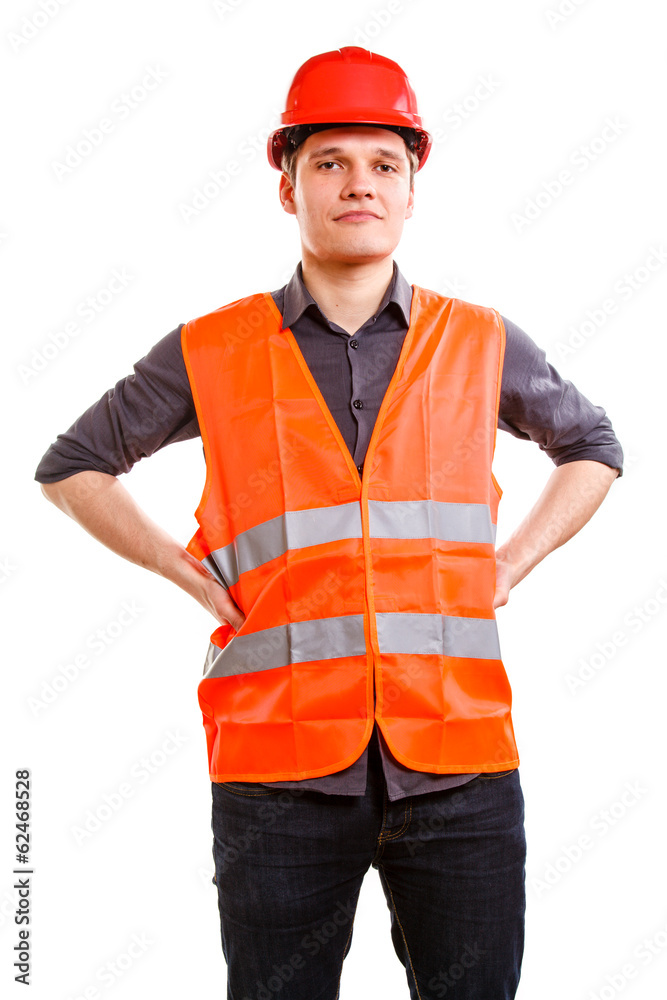 Man worker in safety vest and hard hat. Safety in work. Man worker in safety vest and hard hat. Safety in work.