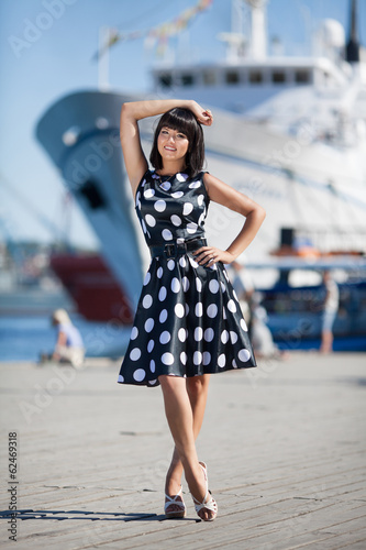 Beautiful woman at sea cruise ship at summer