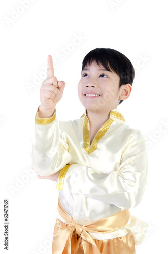 Asian cute boy in thai costume on white background .