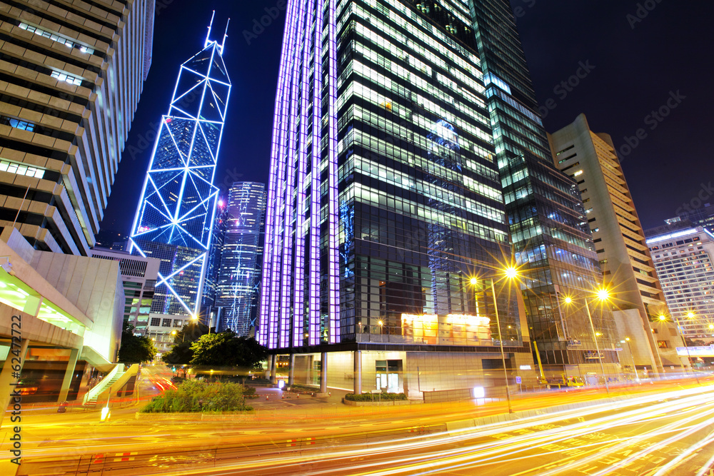 Central business district in Hong Kong with traffic trail Central business district in Hong Kong with traffic trail