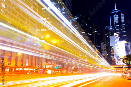 Busy traffic in modern city at night