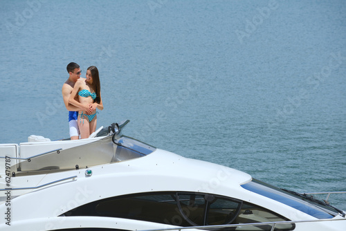 young couple on yacht © .shock