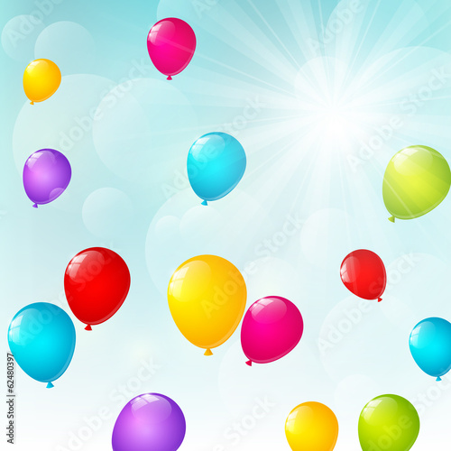 Color balloons on sunny background