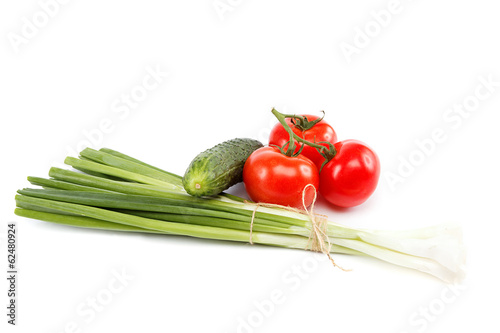 Fresh green onions, cucumber and tomato.