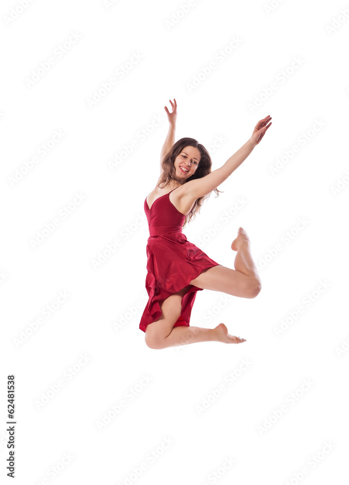 Young ballet dancer wearing red dress isolated