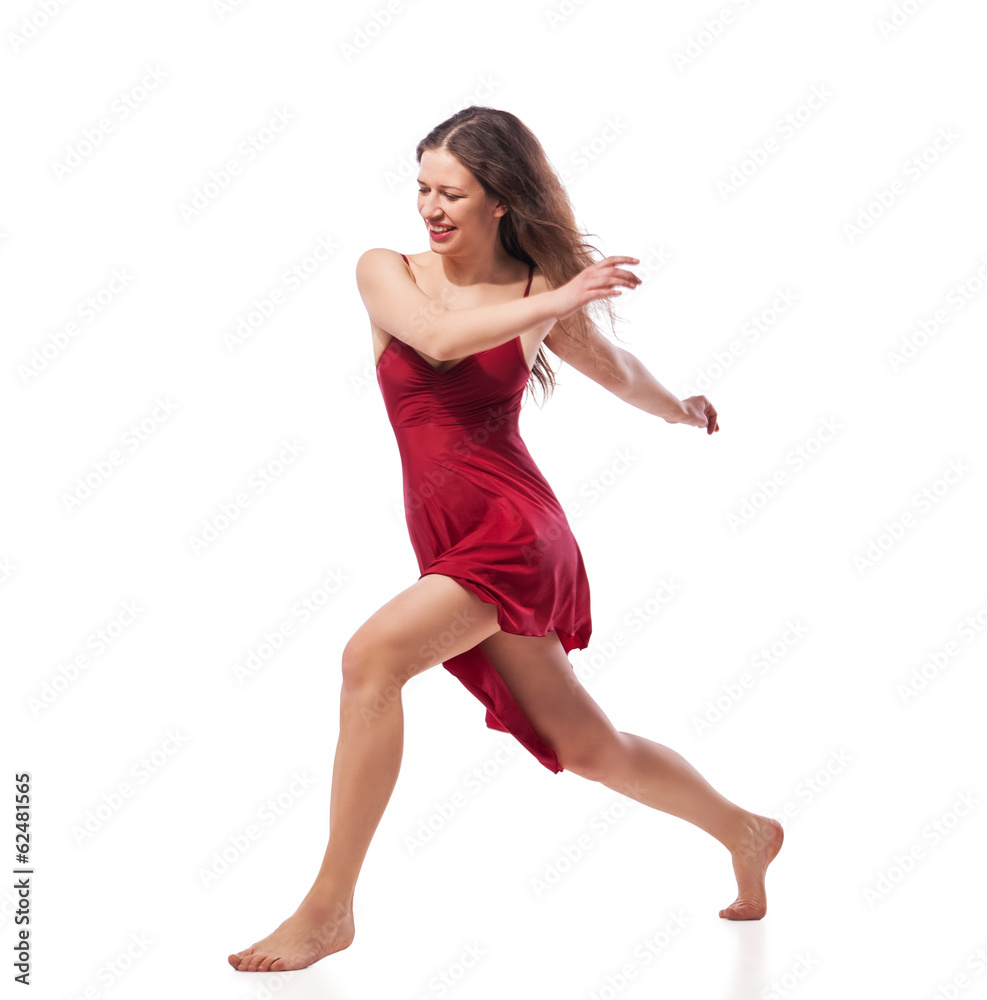 Young ballet dancer wearing red dress isolated