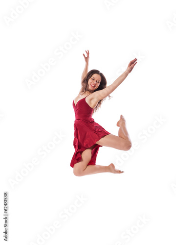 Young ballet dancer wearing red dress isolated