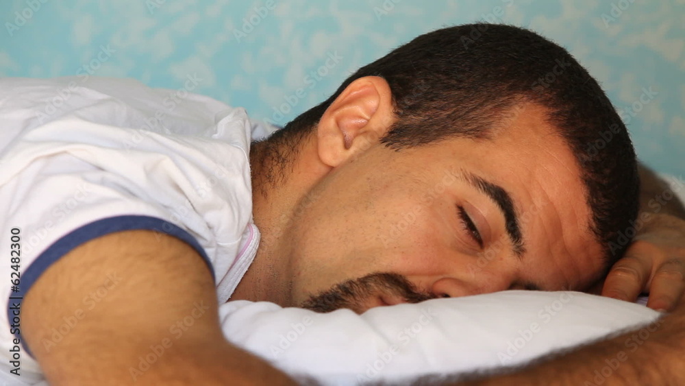 Young Man Trying to Sleep