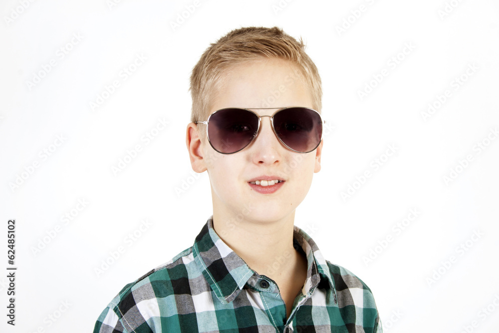 Smiling boy in sunglasses. Youth fashion. Smiling boy in sunglasses. Youth fashion.
