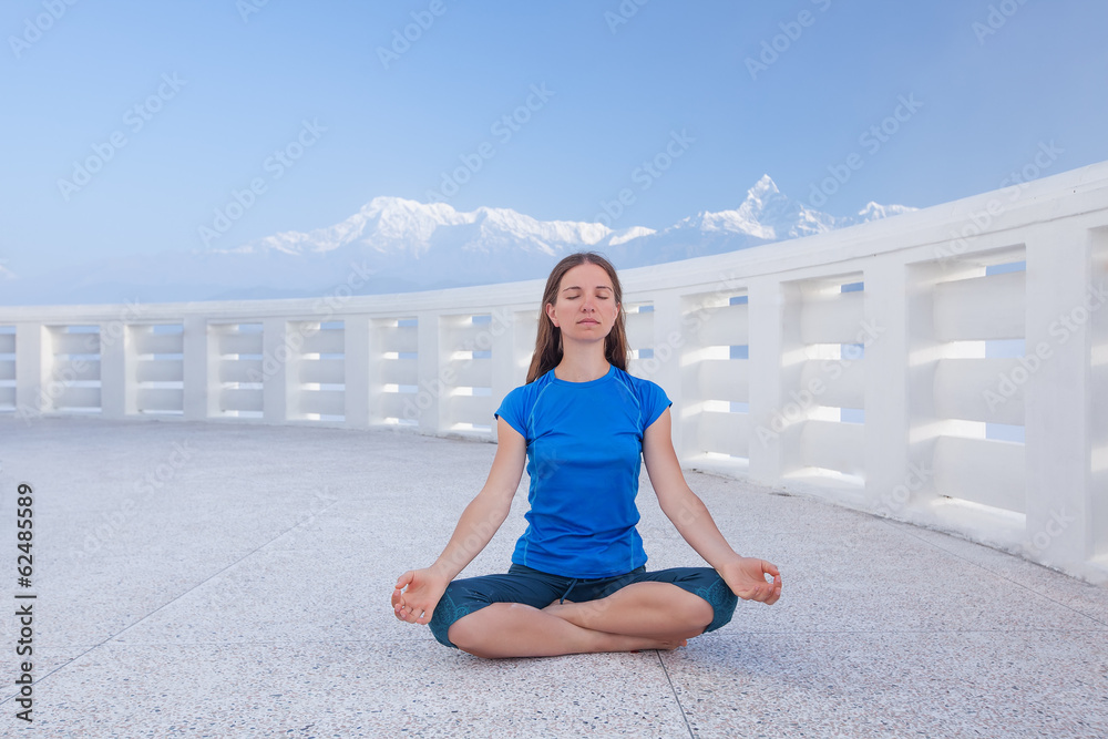 Fototapeta premium Caucasian woman practicing yoga
