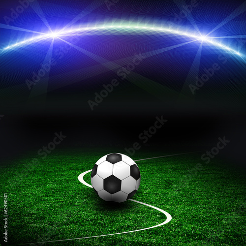 Soccer ball on the green field