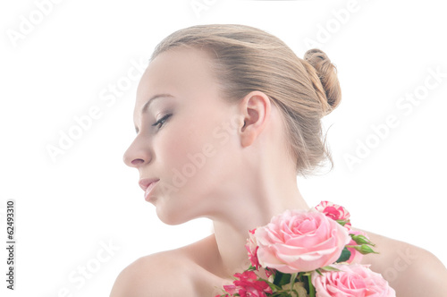 Beauty portrait of girl with bouquet of roses