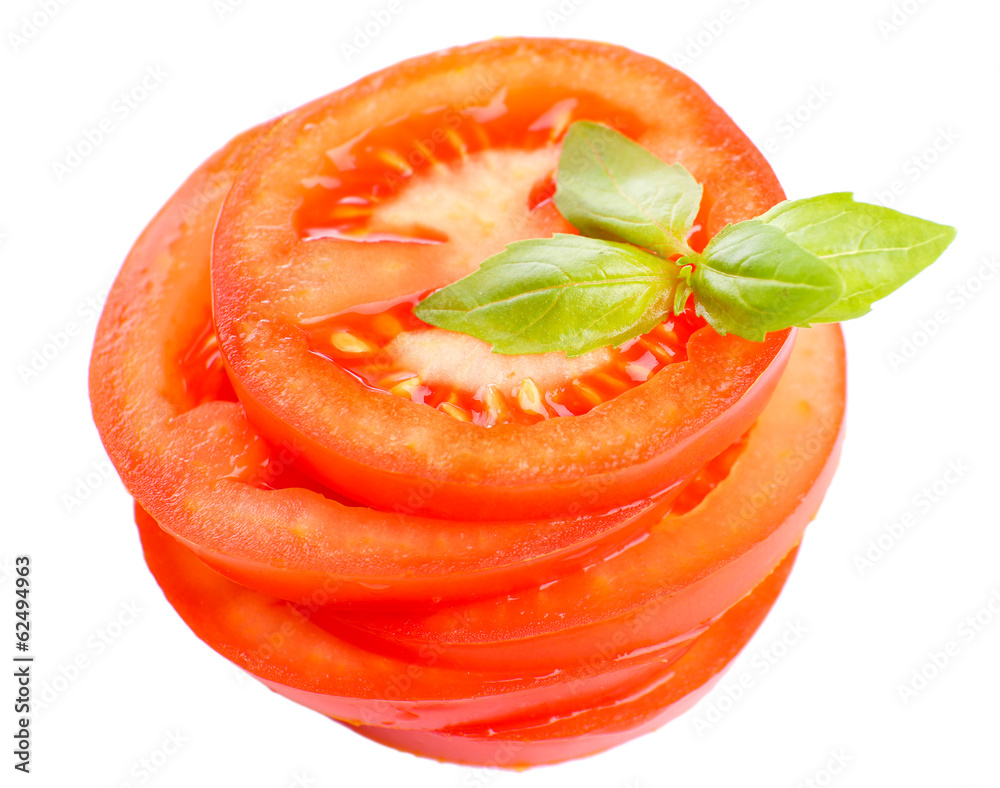 Slices of fresh tomato with basil, isolated on white Slices of fresh tomato with basil, isolated on white