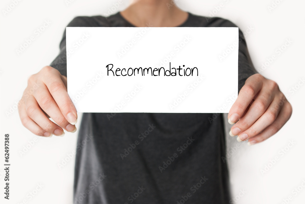 Recommendation letter held in hand Recommendation letter held in hand