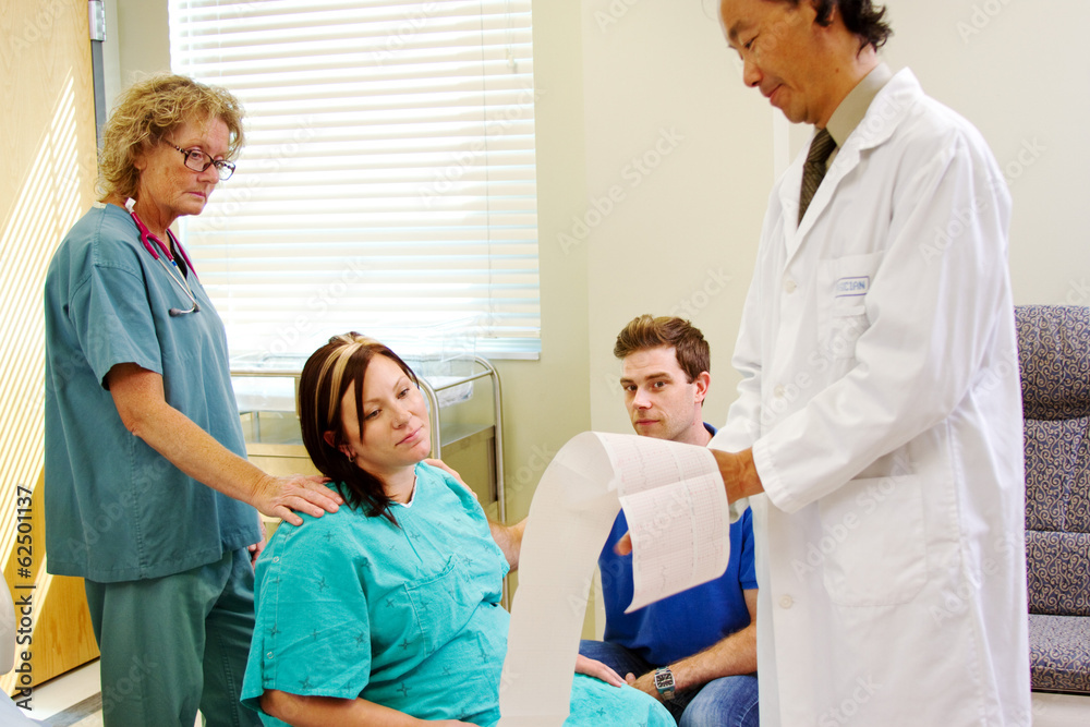 Doctor discussing progress of labor Doctor discussing progress of labor