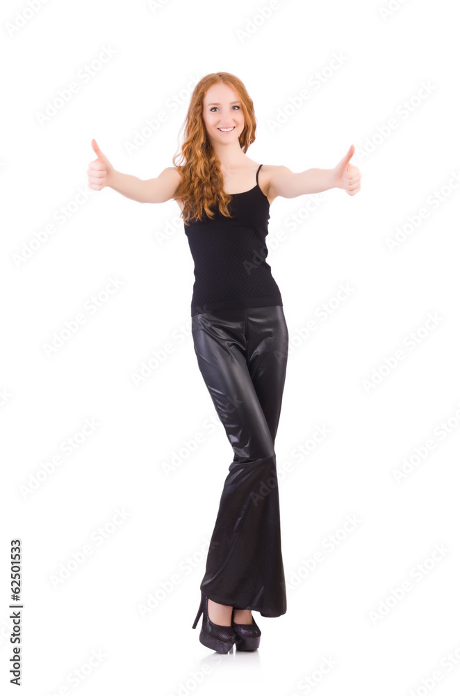 Redhead woman in black bell bottom pants on white Redhead woman in black bell bottom pants on white