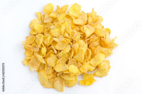 Small sampling of corn flake cereal, isolated