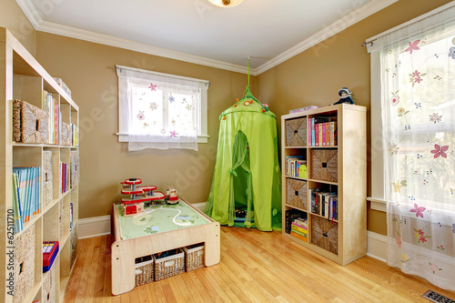 Kids room with a green tent