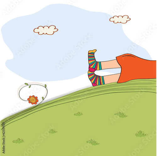 bored girl legs lying on the grass