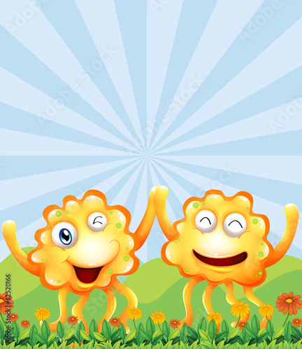 Happy monsters near the hills