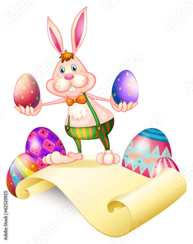 A rabbit holding two Easter eggs