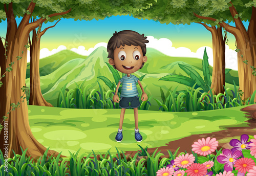 A smiling thin boy at the forest